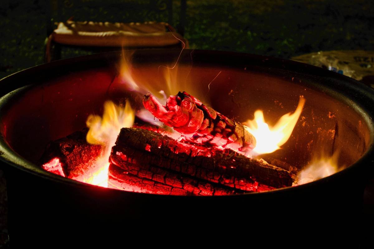 Side-by-side comparison of failed generic cover vs. purpose-built fire pit cover showing heat warping and mildew growth